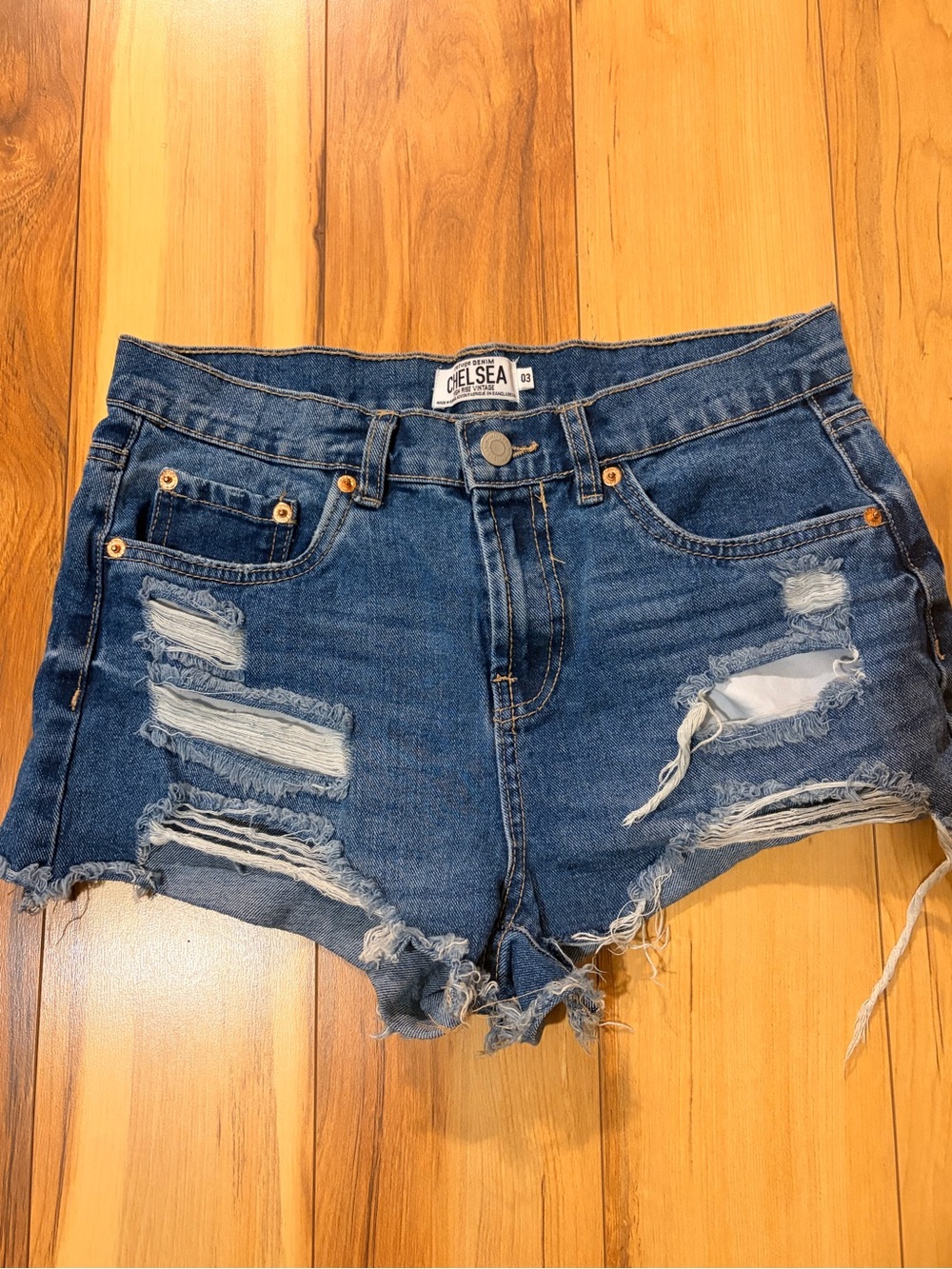 Chelsea Women's Distressed Mid-Blue Denim Cutoff Shorts